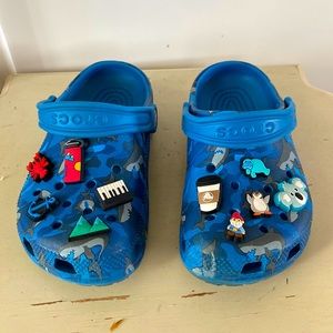 Blue Shark crocs with charms Used J 1
